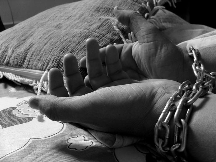 Alegórico a trata de personas y esclavitud moderna