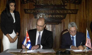 Firma de acuerdos portuarios entre Cuba y Estados Unidos