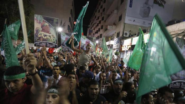 Palestinos celebran el cese al fuego en Gaza. Foto: Reuters
