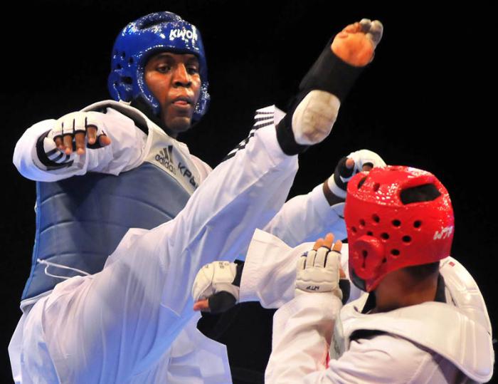 Oro en Taek Wo do centroamericano Robelis Despaigne en + de 87kg por suspencion del combate frente a kristopher Moitland de costa rica