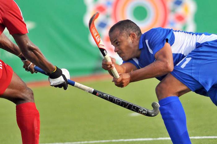 HOCKEY MASCULINO CUBA VS TRINIDAD Y TOBAGO correspodiente a la discusión del oro de los Juegos Centroamericanos y del caribe de Veracruz 2014. En la foto, Yoandy Blanco, el jugador mas destacado.