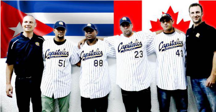 De izquierda a derecha, Michel Laplante (presidente de Quebec Les Capitales), los peloteros cubanos Yunieski Gurriel, Alexei Bell, Ismel Jiménez, Yordan Manduley y Patrick Scalabrini (manager de Quebec Les Capitales), durante la firma del contrato de los cuatro jugadores. Foto: Otmaro Rodríguez 
