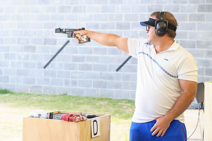 FORT BENNING - MAY 16: Silver medalist Leuris PUPO of Cuba competes in the 25m Rapid Fire Pistol Men Finals at the Shooting Range of the United States Army Marksmanship Unit during Day 4 of the ISSF World Cup Rifle/Pistol on May 16, 2015 in Fort Benning, Georgia, United States of America. (Photo by Nicolo Zangirolami)