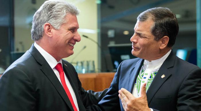 Ecuador's President Rafael Correa, right, speaks with Cuba's First Vice-President Miguel Diaz-Canel Bermudez during a round table meeting at the EU-CELAC summit in Brussels on Wednesday, June 10, 2015. European leaders and their Latin America and Caribbean counterparts meet on a biannual basis in an effort to maintain international and economic ties. (AP Photo/Geert Vanden Wijngaert)