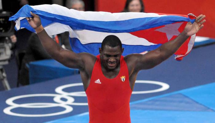 XXX Juegos Olimpicos- Lucha Grecorromana 120 KG Mijain López gana su segundo medalla de oro olímpica.