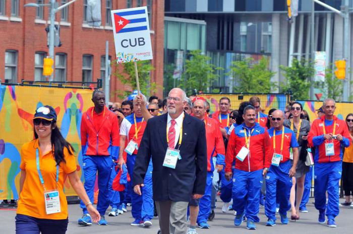 Recorrido por la zona internacional de la villa panamericana e izamiento de la bandera cubana atletas y federativos