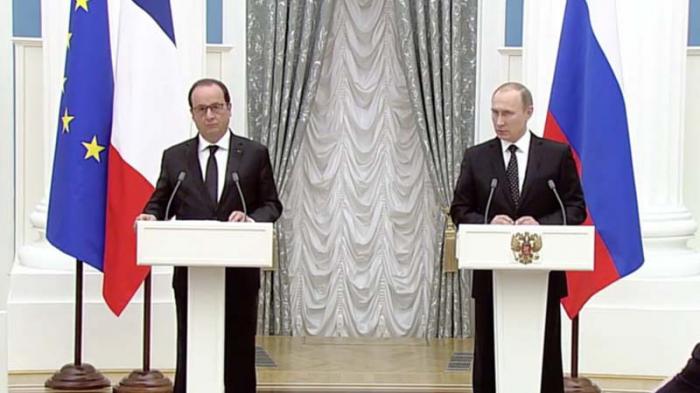 A la izquierda François Hollande, presidente de Francia, y a la derecha Vladimir Putin, presidente de Rusia. 