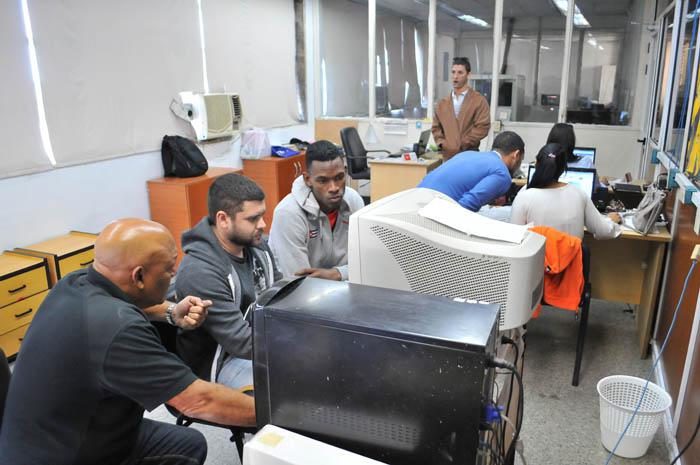 Carlos Banasco, presidente de la Federación Cubana y Comisionado nacional de Taekwondo, y el campeón mundial Rafael Alba en entrevista online.