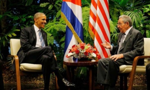 Raul Castro y Barack Obama conversando