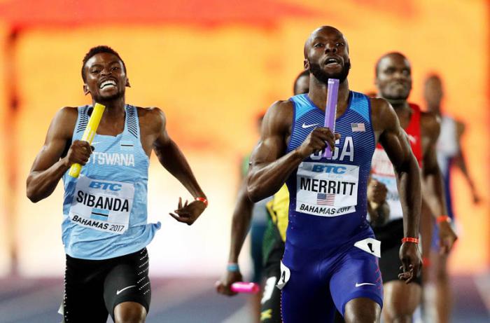 NASSAU, BAHAMAS - APRIL 23:  LaShawn Merritt of the USA and  Karabo Sibanda of Botswana run to the finishline in the Men's 4x400 Metres Relay Final during the IAAF/BTC World Relays Bahamas 2017 at Thomas Robinson Stadium on April 23, 2017 in Nassau, Bahamas.  (Photo by Patrick Smith/Getty Images for IAAF)