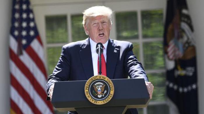 Donald Trump anuncia en los jardines de la Casa Blanca la salida de Estados Unidos del Acuerdo de Paris.