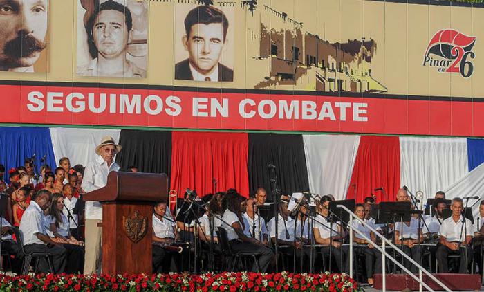 Acto central por el Aniversario 64 de los Asaltos a los Cuarteles Moncada y Carlos Manuel de Céspedes y  el día de la Rebeldía Nacional en la Plaza de la  Revolución de la Provincia de Pinar del Río, presiden el acto el Presidente de los Consejos de Estado y de Ministros, General de Ejército Raúl Castro Ruz, el primer vicepresidente de los Consejos de Estado y de Ministros de Cuba, Miguel Díaz-Canel Bermúdez, José Ramón Machado Ventura, Segundo Secretario del Comité Central del Partido Comunista de Cuba, La Primera Secretaria del PCC en Pinar del Rio Gladys Martínez Verdecia y otros dirigentes del Gobierno.