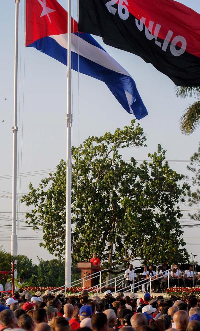 Acto central por el Aniversario 64 de los Asaltos a los Cuarteles Moncada y Carlos Manuel de Céspedes y  el día de la Rebeldía Nacional en la Plaza de la  Revolución de la Provincia de Pinar del Río, presiden el acto el Presidente de los Consejos de Estado y de Ministros, General de Ejército Raúl Castro Ruz, el primer vicepresidente de los Consejos de Estado y de Ministros de Cuba, Miguel Díaz-Canel Bermúdez, José Ramón Machado Ventura, Segundo Secretario del Comité Central del Partido Comunista de Cuba, La Primera Secretaria del PCC en Pinar del Rio Gladys Martínez Verdecia y otros dirigentes del Gobierno.
