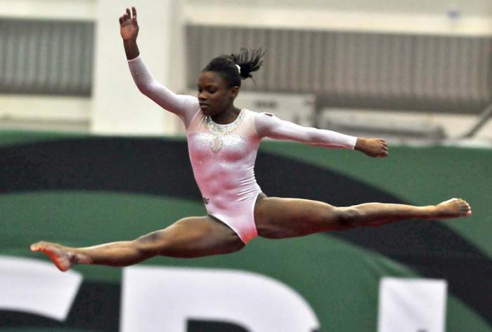 Gimnasia oro en manos libre Yesenia Ferrera