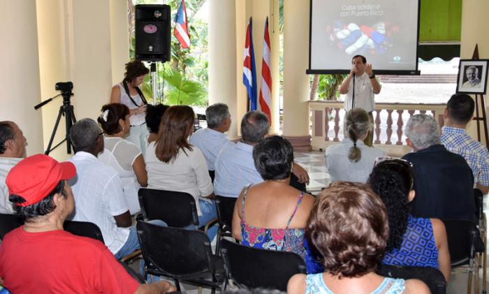 Acto en el ICAP, como parte de la jornada de homenaje por la descolonización de Puerto Rico. Hace uso de la palabra Fernando González Llort, presidente de la institución