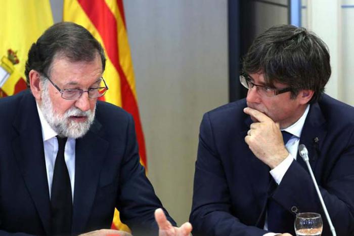 Mariano Rajoy y Carles Puigdemont