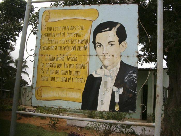 Pintura de Martí en una valla del Memorial Caimito del Hanábana. Foto del autor