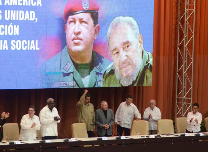 Acto de conmemoración por el XII Aniversario de la creación del ALBA-TCP. Presiden: General de Ejército Raúl Castro Ruz (Presidente del Consejo de Estado y de Ministros), Nicolás Maduro (Presidente de la República Bolivariana de Venezuela), José Ramon Machado Ventura (Segundo Secretario del Partido  y Vicepresidente de los Consejos de Estados y de Ministros), Miguel Díaz Canel (Primer Vicepresidente de los Consejos de Estados y de Ministros)