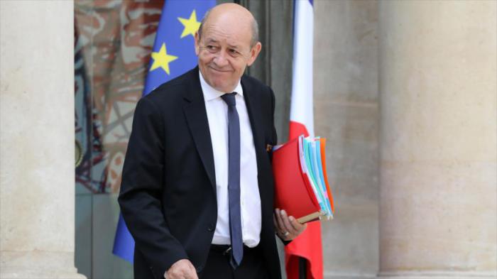 El ministro de Exteriores de Francia, Jean-Yves Le Drian, sale del Palacio del Elíseo en París, 23 de mayo de 2018.