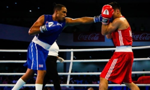 Arlen López, de Cuba, combate en 75 Kg frente a Diego Moreno, de México, durante los cuartos de final del boxeo de los 23 Juegos Centroamericanos y del Caribe Barranquilla 2018 con sede en salón Jumbo del Country Club el viernes 27 de Julio de 2018, en Ba