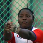 Cartagena, COLOMBIA:  La atleta cubana Yunaika Crawford lanza el martillo ganando la medalla de Plata en esta modalidad,  en Cartagena, Colombia el 27 de julio de 2006, durante los XX Juegos Deportivos Centroamericanos y del Caribe que se realizan hasta el 30 de julio con la participacion de atletas de 32 paises.   AFP PHOTO/MARTIN BERNETTI  (Photo credit should read MARTIN BERNETTI/AFP/Getty Images)