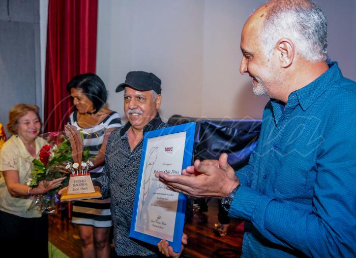 Entrega de los Premios Juan Gualberto Gómez por la obra del año y José Martí por la Obra de la Vida en el Memorial José Martí, el evento estuvo presidido por; Ricardo Ronquillo Bello, presidente de la UPEC y 
Joel Suárez Pellé, jefe del Departamento Ideológico del Comité Central del Partido,Roberto Chile, Realizador, camarografo y fotógrafo, Premio José Martí 2018