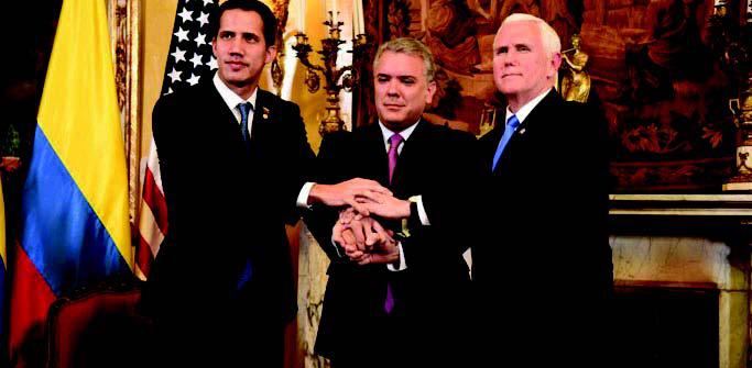 Juan Guaidó junto al presidente colombiano Iván Duque y al vicepresidente estadounidense Mike Pence. Foto: TN.com