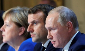 Angela Merkel, Emmanuel Macron y Vladimir Putin
