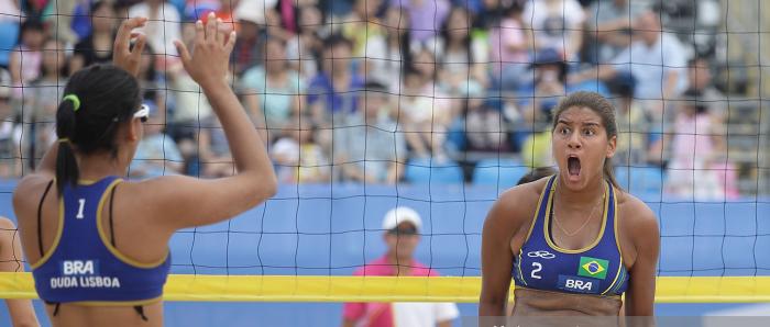 NANJING, CHINA - AUGUST 26:  Ana Patricia Silva Ramos (R) and Eduarda Santos Lisboa of Brazil of Brazil celebrate winning a point over  Russia during the Nanjing 2014