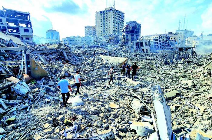 La cifra de fallecidos por los bombardeos a territorio palestino ya ha superado el
millar. FOTO: AP
