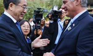 Miguel Diaz Canel con el compañero Ding Xuexiang