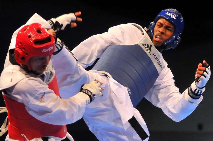 Oro en Taek Wo do centroamericano Rafael Alba - 87 contra Craing Braown de jamaica. x superioridad