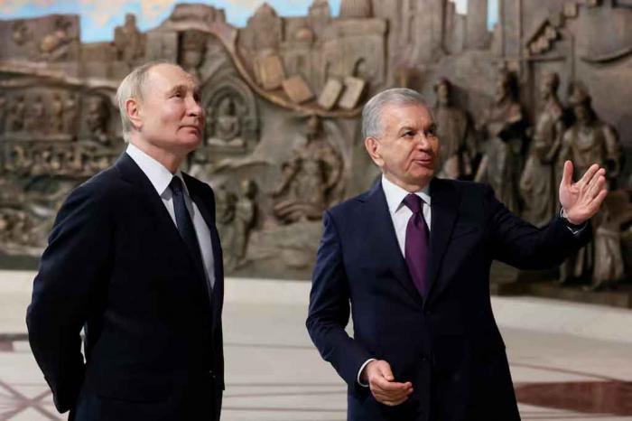 Vladimir Putin y Shavkat Mirziyoyev