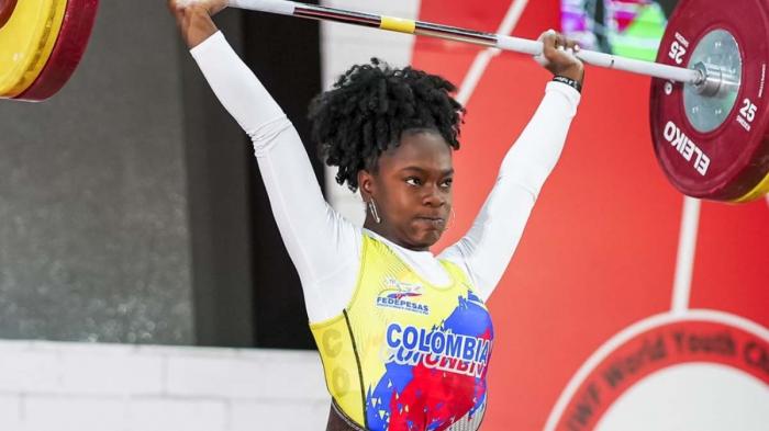 La colombiana Ingrid Segura conquistó tres títulos en la división de 64 kg, al alzar 101 kg 
en el arranque y 130 en el envión, para un total de 231 kg. 