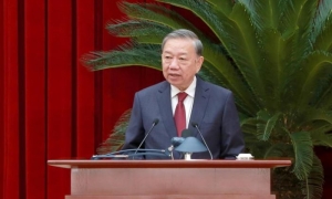  secretario general de la organización, To Lam. 