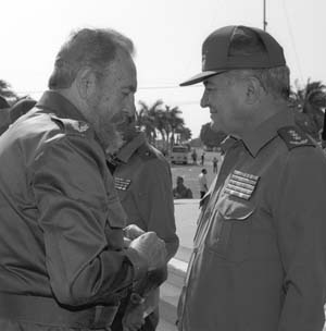 El 19 de abril del 2001, el Comandante en Jefe lo condecora con el t�tulo honor�fico de H�roe de la Rep�blica de Cuba y la Orden de Playa Gir�n.