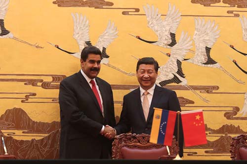 El presidente venezolano Nicolás Maduro (izquierda), junto a su homólogo chino Xi Jinping Foto: Marcelo García Prensa Presidencial