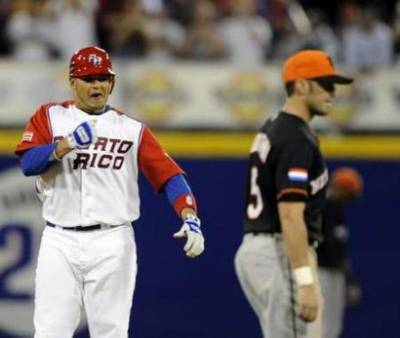 Un doblete del receptor Yadiel Molina con las bases llenas, acab con la ilusin de los holandeses