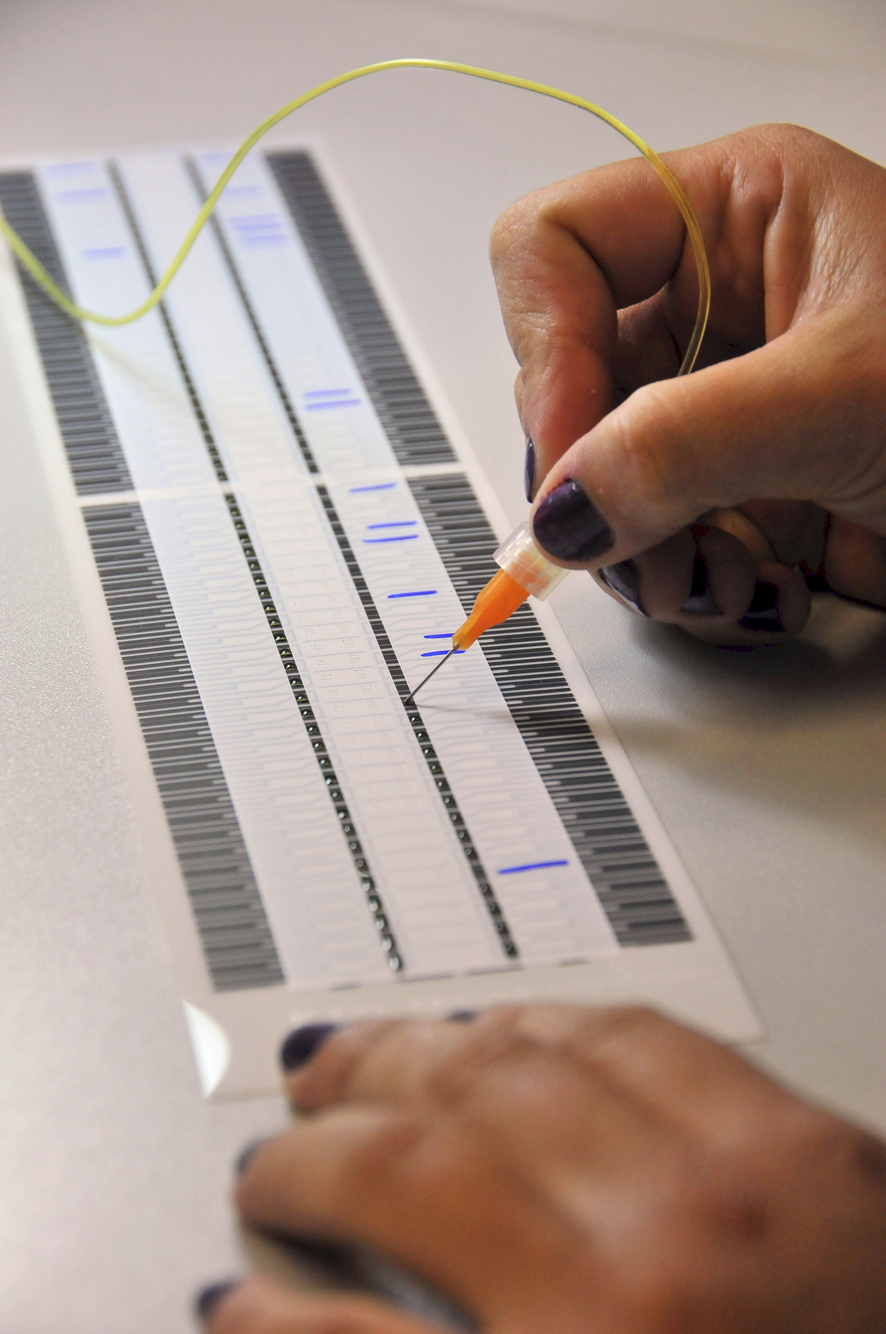 Reactive substances are added manually, a delicate, precise process.