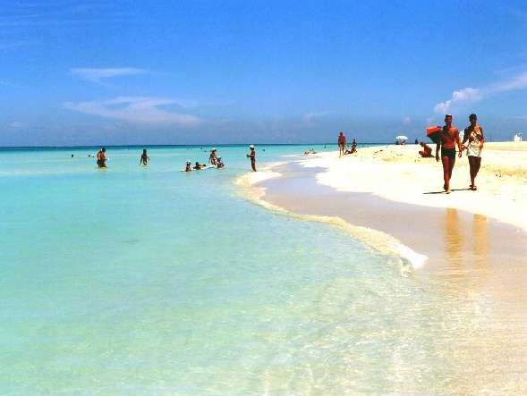 Tourists from the U.S. can not enjoy Cubas natural environment, its beautiful beaches, or warm climate.